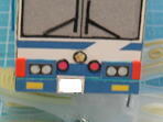 写真：前のナンバープレートを貼り付けた状態